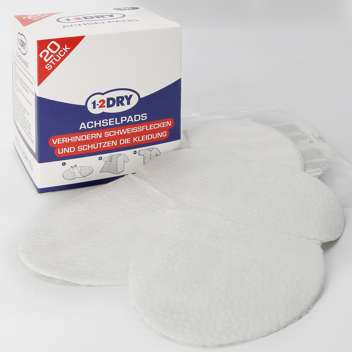 1-2DRY Achselpads medium weiß - 20 Stück als Schachtel und ausgepackt auf weißem Hintergrund