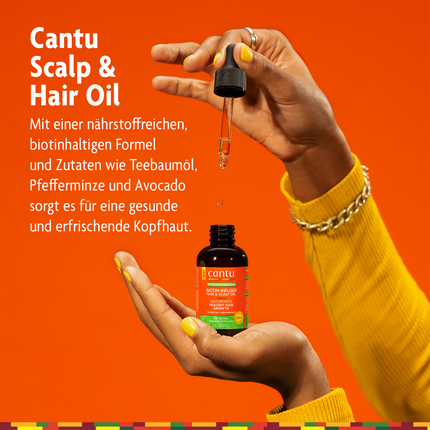 Cantu Scalp & Hair Oil auf Hand und Schrift auf orangefarbenen Grund