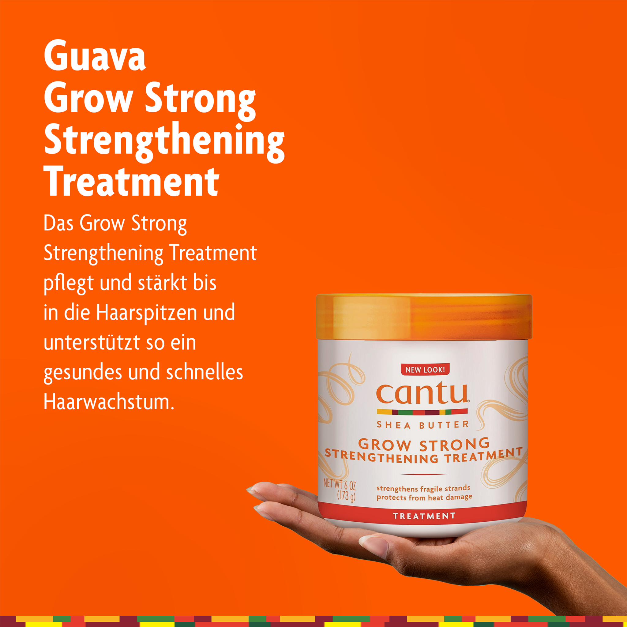 Cantu Grow Strong Strengthening Treatment - 173g auf Hand und Schrift auf orangefarbenen Grund