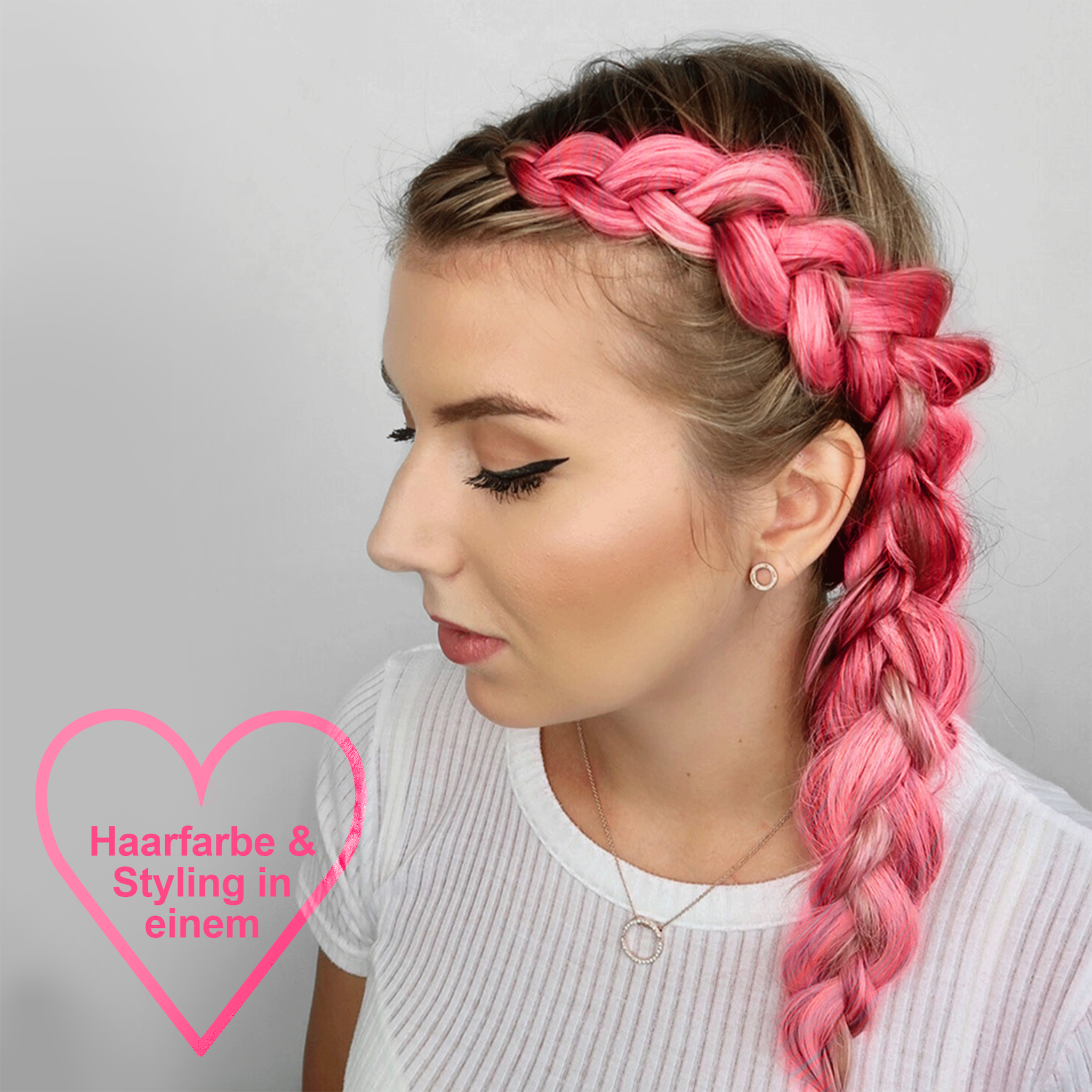 Frau mit I Heart Revolution Rainbow Tones Pink in den Haaren und Herz mit Schrift