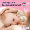 Closeup von Kind, dass gestillt wird, Schrift auf farbiger Welle