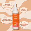 Cantu Guava & Ginger Pre-Cleanse Treatment - 180ml auf gemustertem Grund und Schrift in ovalen Kreisen