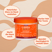 Cantu Moisturizing Twist & Lock und Schrift in ovalen Kreisen auf gemustertem Grund