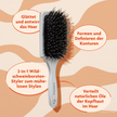 Cantu Thick Hair Longer Bristle Brush - 1 Stück und Schrift in ovalen Kreisen auf gemustertem Grund