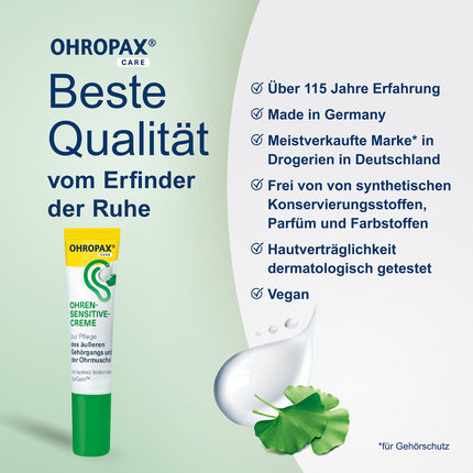 OHROPAX Ohren-Sensitive-Creme Tube auf grünem Grund, Cremeklecks, Pflanzen und Schrift