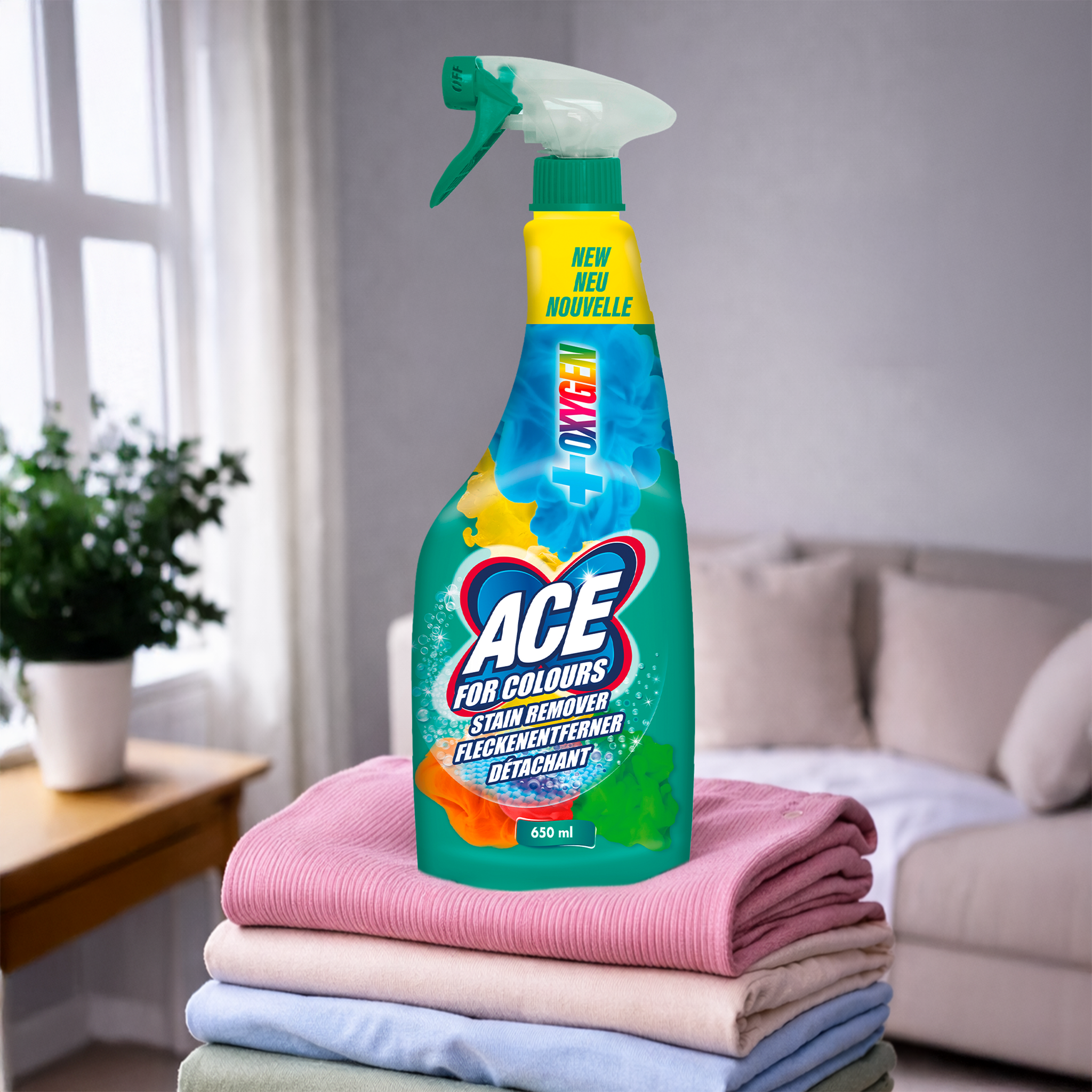 ACE Fleckenentferner Spray auf buntem Wäschestapel