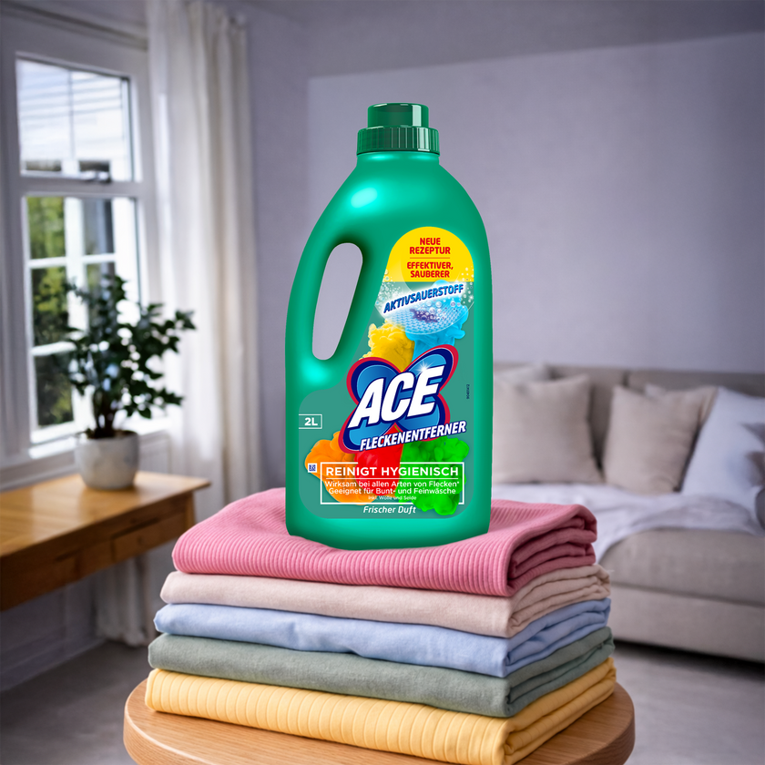 ACE Fleckenentferner und Farbschutz auf buntem Wäschestapel in Wohnung